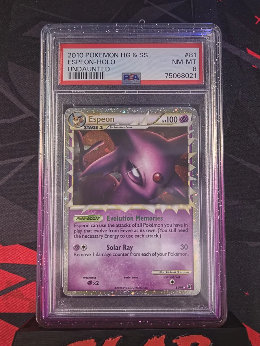 PSA 8 NM-MT 2010 Pokémon HeartGold & SoulSilver Undaunted Espeon Prime holo 81/90 in a PSA slab